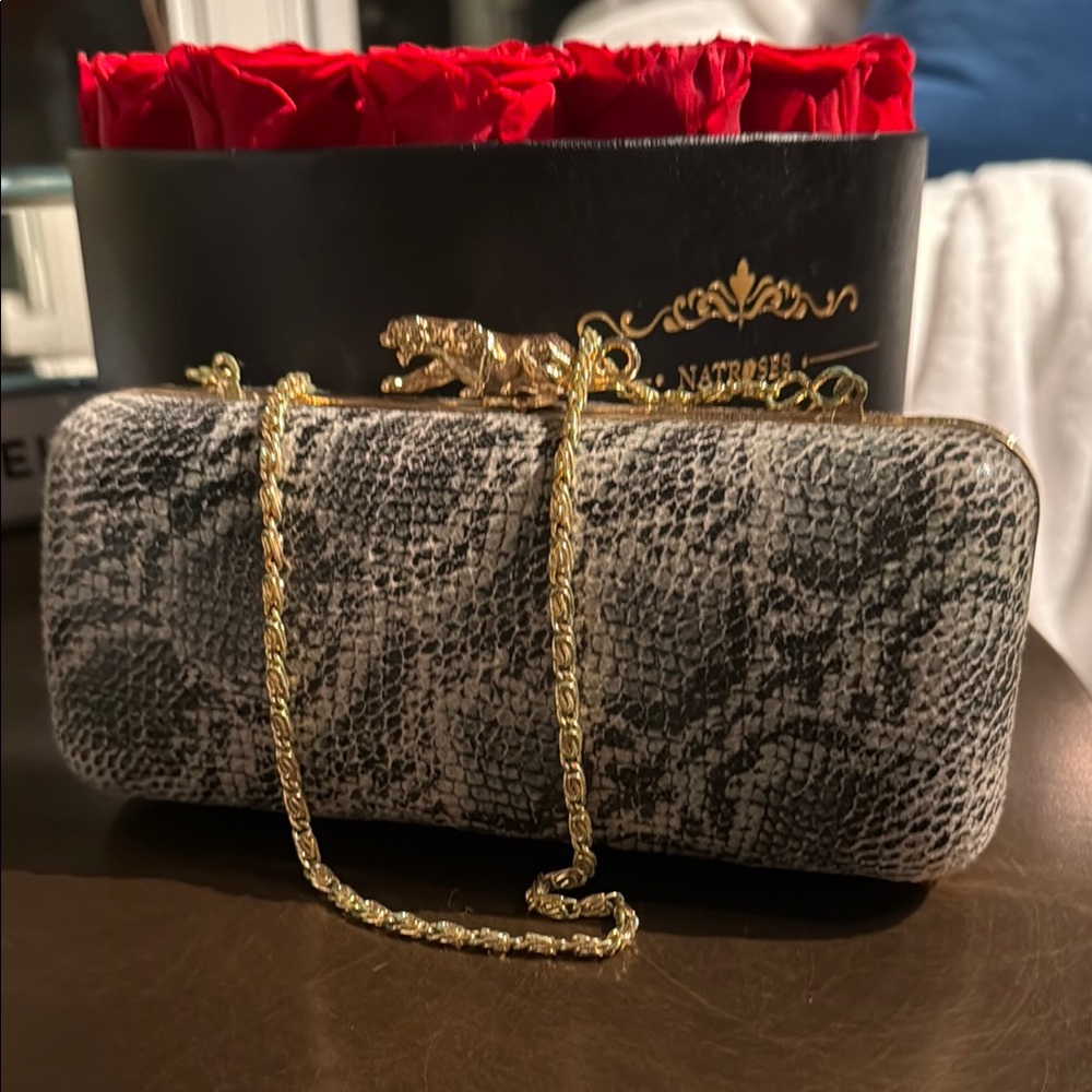 Gray Textured Clutch with Gold Chain and Cylindrical Design